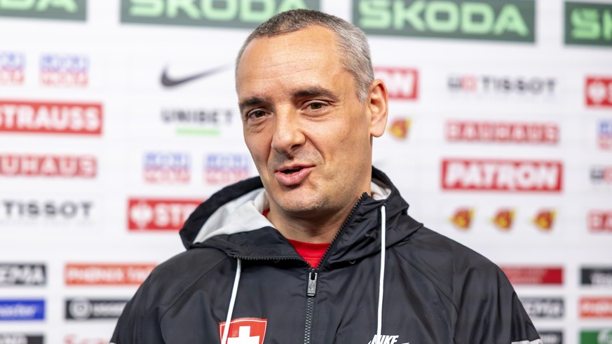 Jan Cadieux Jan, assistant coach of Switzerland national ice hockey team, speaks with media in the mixed zone of the Jyske Bank Boxen after a Switzerland team training session, at the IIHF 2025 World  ...