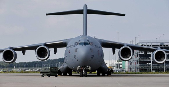 epa04326630 A Boeing C-17 of the Royal Australian Air Force at Eindhoven Airbase near Eindhoven, The Netherlands, 22 July 2014. The aircraft will, together with aircraft of the Dutch Air Force, repatr ...