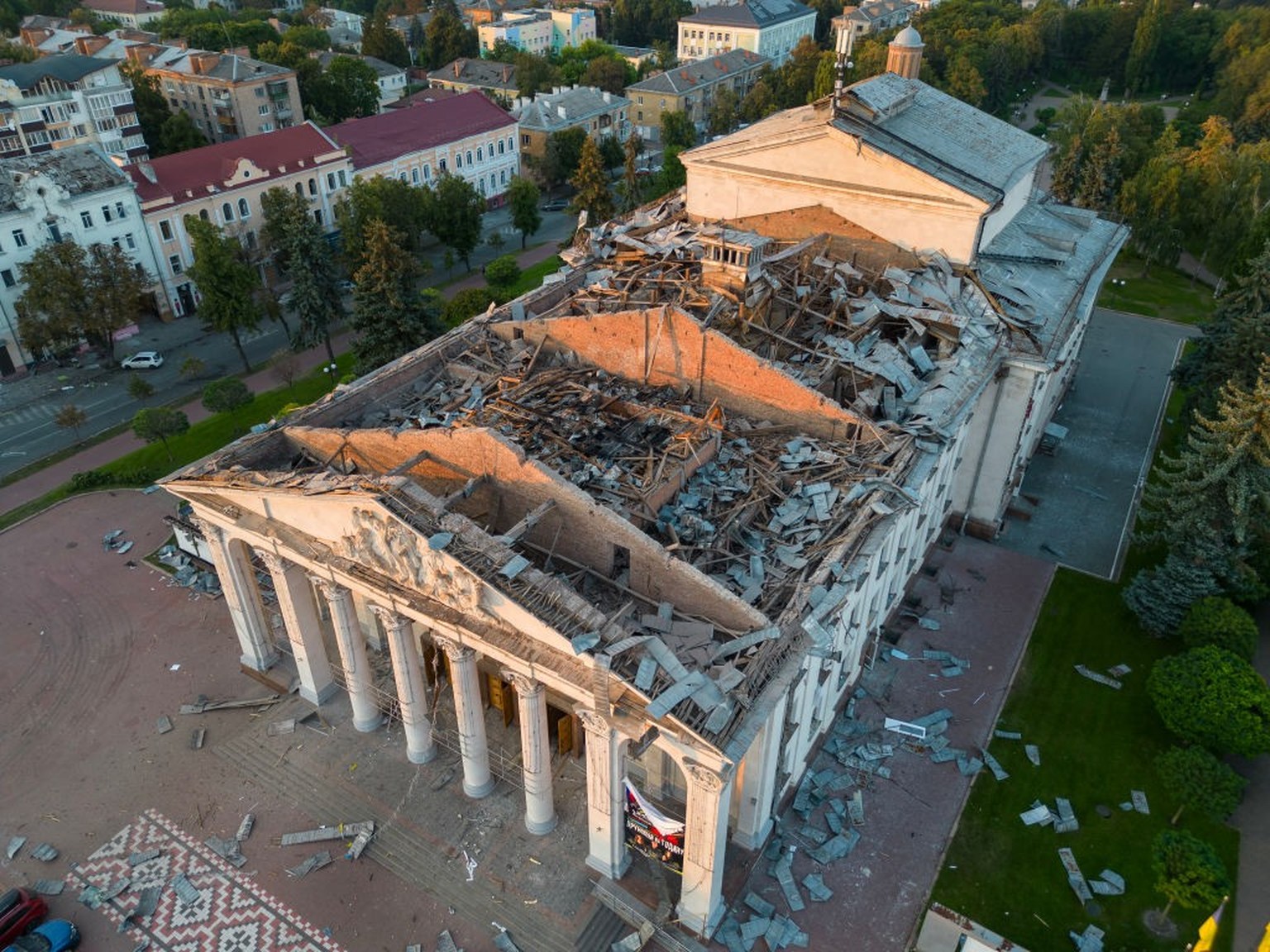 CHERNIHIV, UKRAINE - AUGUST 19: In this aerial image, damage is seen from a late morning missile attack hitting the Chernihiv Regional Academic Ukrainian Music and Drama Theater that killed 7 people,  ...