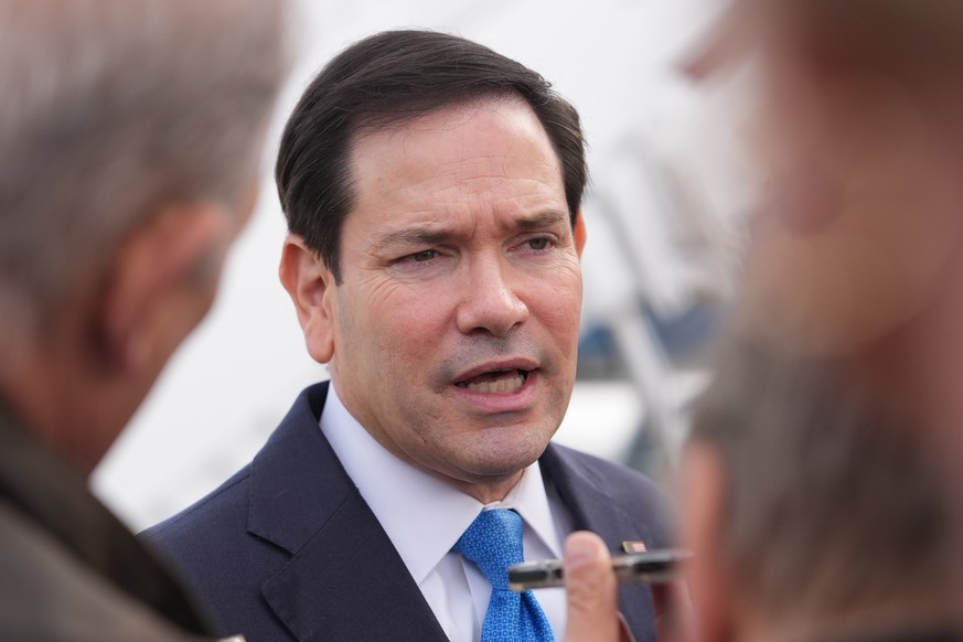 Secretary of State Marco Rubio speaks to the press before boarding a plane, Monday, Oct. 5, 2026, at Joint Base Andrews, Md., en route to Iceland. (AP Photo/Mark Schiefelbein, Pool)
Marco Rubio