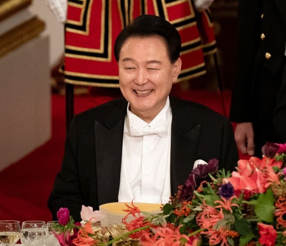 South Korean President state visit to the UK President of South Korea Yoon Suk Yeol listens as King Charles III speaks at the state banquet at Buckingham Palace, London, for the state visit to the UK  ...