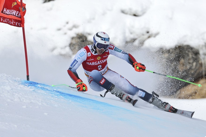 Norway&#039;s Henrik Kristoffersen speeds down the course during the first run of an alpine ski, men&#039;s World Cup giant slalom in Val d&#039;sere, France, Saturday, Dec. 9, 2023. (AP Photo/Marco T ...