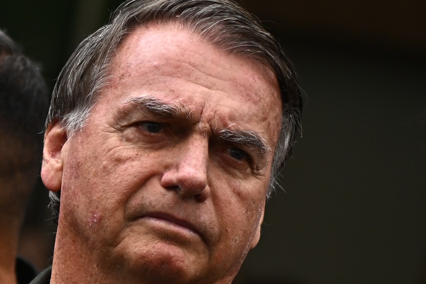 epa12377400 Brazilian former President Jair Bolsonaro leaves the DF Star Hospital in Brasilia, Brazil, 14 September 2025. Bolsonaro returned to house arrest at his residence in Brasilia hours after be ...