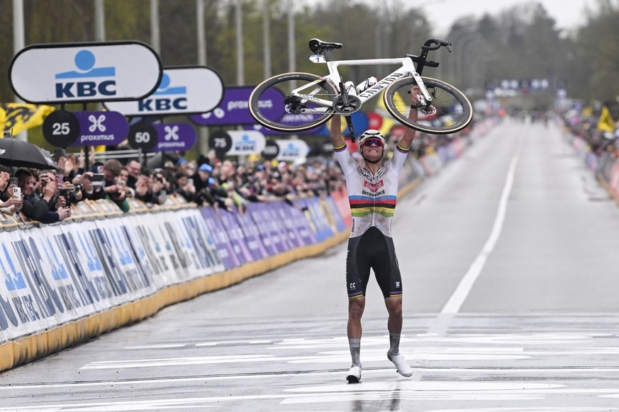 epa11253254 Dutch rider Mathieu van der Poel of team Alpecin Deceuninck celebrates as he wins the Ronde van Vlaanderen (Tour of Flanders) cycling classic over 270.8km from Antwerp to Oudenaarde, Belgi ...