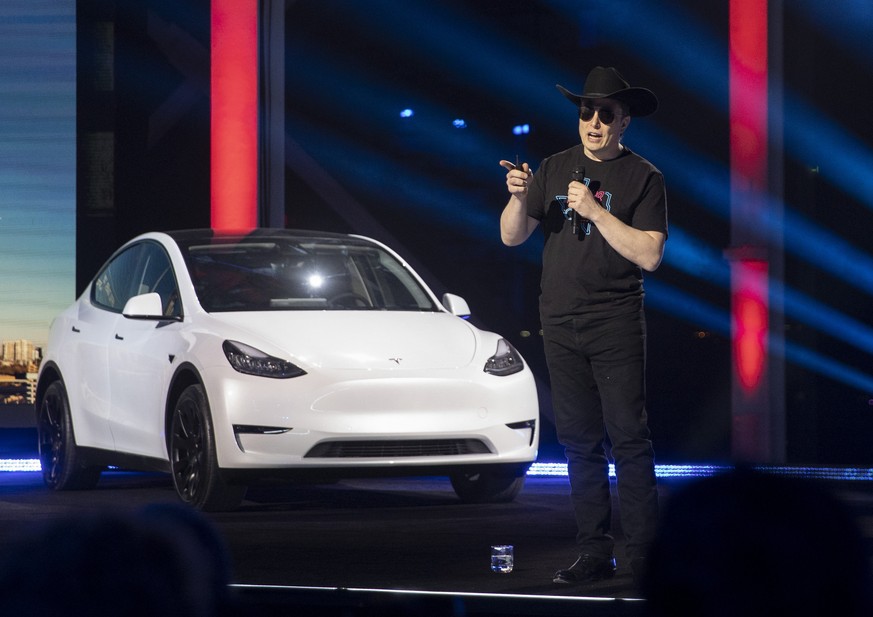 Tesla CEO Elon Musk speaks at the &quot;Cyber Rodeo&quot; grand opening celebration for the new $1.1 billion Tesla Giga Texas manufacturing facility in Austin, Texas, on Thursday April 7, 2022. The ev ...