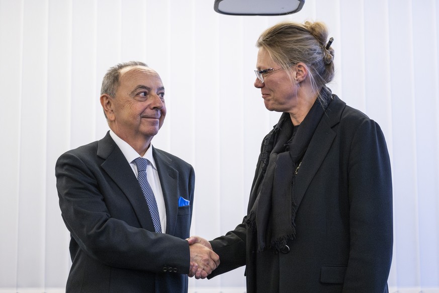 epa12758152 Beatrice Pilloud (R), Attorney General of the Canton of Valais, and Francesco Lo Voi (L), Chief Prosecutor of Rome, shake hands after their meeting between prosecutors of the Canton of Val ...