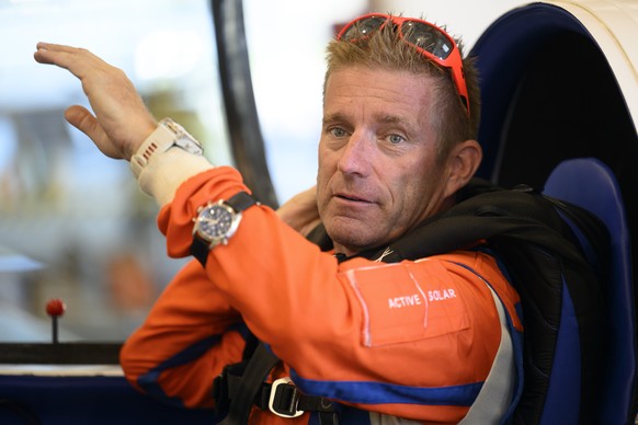 epa12289656 Swiss adventurer Raphael Domjan prepares for take-off during the first world record attempt of the season to reach 10,000 metres of altitude with the SolarStratos solar-powered aircraft pr ...