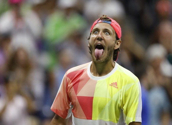 Lucas Pouille, of France, reacts after beating Rafael Nadal, of Spain, during the fourth round of the U.S. Open tennis tournament, Sunday, Sept. 4, 2016, in New York. (AP Photo/Adam Hunger)