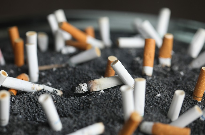 FILE - This March 28, 2019 photo shows cigarette butts in an ashtray in New York. On Tuesday, March 9, 2021. Lung cancer is the nation���s top cancer killer, causing more than 135,000 deaths each year ...