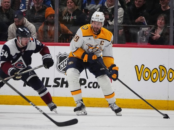 Roman Josi (à droite) a délivré plusieurs caviars sur la glace de Denver.
