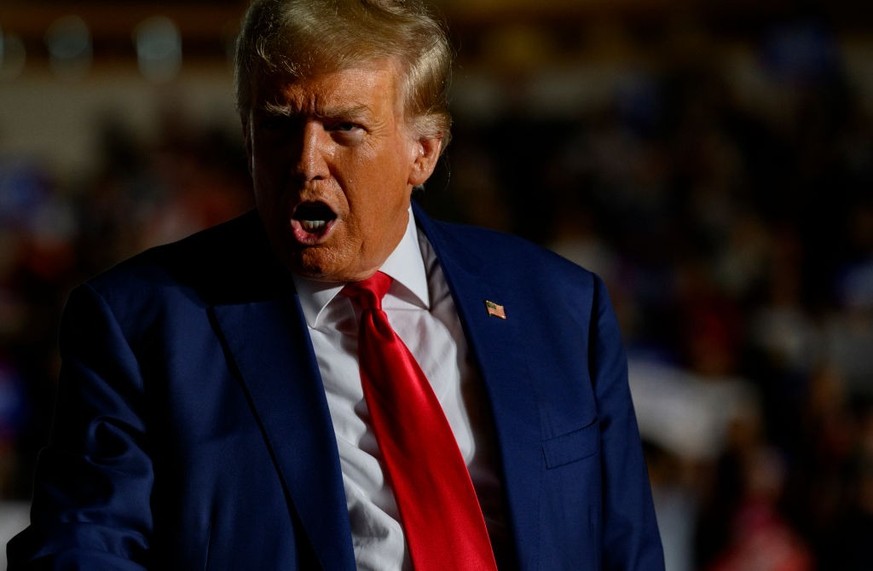 ERIE, PENNSYLVANIA - JULY 29: Former U.S. President Donald Trump enters Erie Insurance Arena for a political rally while campaigning for the GOP nomination in the 2024 election on July 29, 2023 in Eri ...