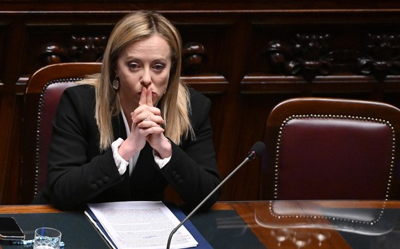epa10363236 Italian Prime Minister Giorgia Meloni looks on during a session of the Lower House of parliament in Rome, Italy, 13 December 2022. Meloni reported to the Lower House before this week&#039; ...