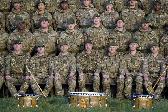 Royal visit to 1st Battalion Mercian Regiment The Prince of Wales, Colonel-in-Chief, 1st Battalion Mercian Regiment front row centre joins members of the battalion for a group photograph during a visi ...