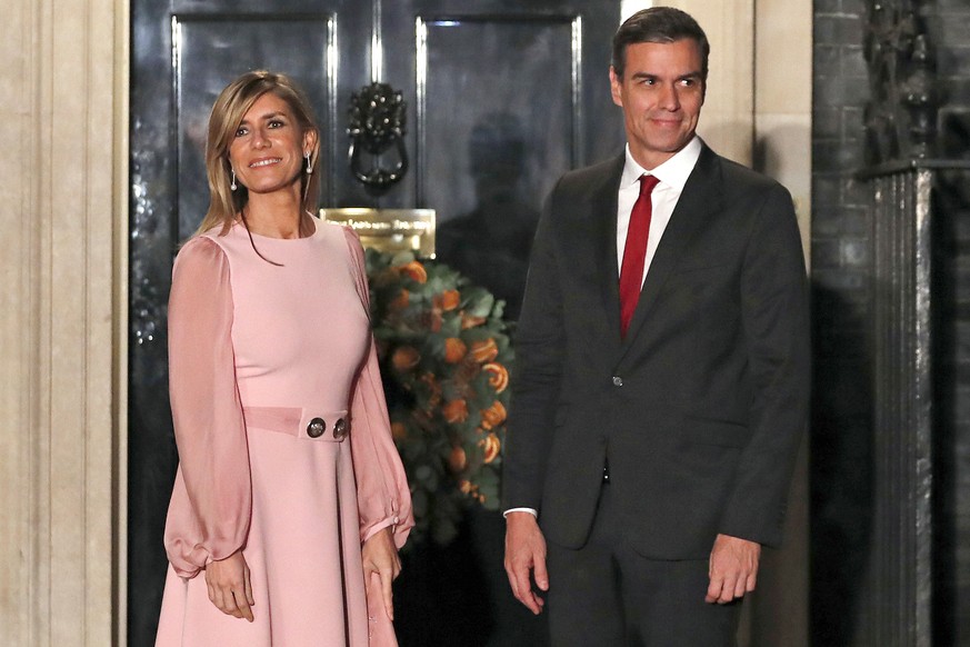 FILE - Spanish Prime Minister Pedro Sanchez and his wife Begoña Gómez arrive at 10 Downing Street, in London, Dec. 3, 2019. A Spanish investigative judge has summoned the wife of Spain?s prime ministe ...