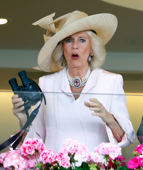 ASCOT, UNITED KINGDOM - JUNE 22: (EMBARGOED FOR PUBLICATION IN UK NEWSPAPERS UNTIL 24 HOURS AFTER CREATE DATE AND TIME) Queen Camilla is visibly emotional after her horse 'Desert Hero' (whic ...