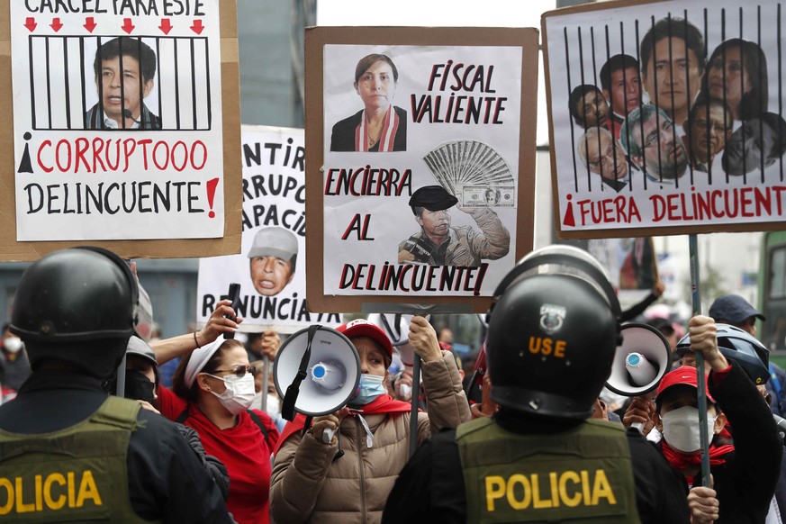 epa10105987 Protesters against the government of the president of Peru, Pedro Castillo, remain outside the Office of the Prosecutor of the Nation in Lima, Peru, 04 August 2022. Castillo declared to th ...