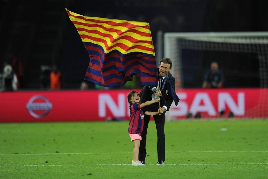Luis Enrique avec sa fille Xana en 2015 après la victoire du Barça en Ligue des champions.