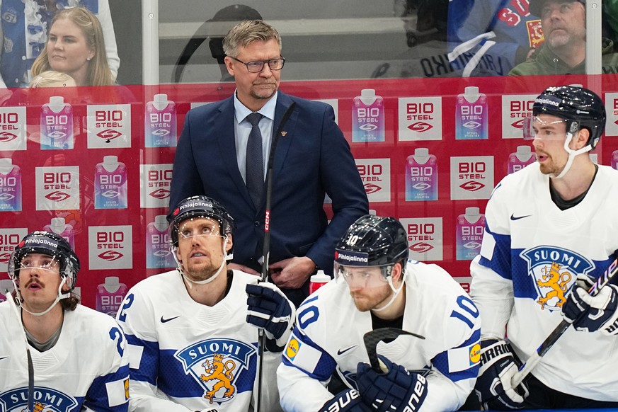 Finland&#039;s head coach Jukka Jalonen watches the quarterfinal match between Canada and Finland at the ice hockey world championship in Tampere, Finland, Thursday, May 25, 2023. (AP Photo/Pavel Golo ...
