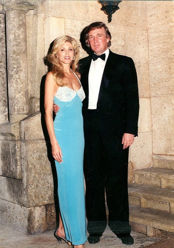 Portrait of married couple Marla Maples and businessman Donald Trump as they pose together at the Mar-a-Lago estate, Palm Beach, Florida, 1994. (Photo by Davidoff Studios/Getty Images)