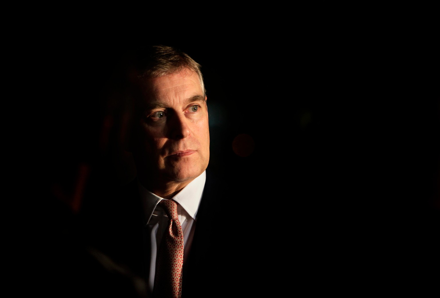 FILE - Britain&#039;s Prince Andrew looks on during an event at the residence of the British Ambassador in New Delhi, India, March 10, 2010. (AP Photo/Manish Swarup, File)
Britain Royals