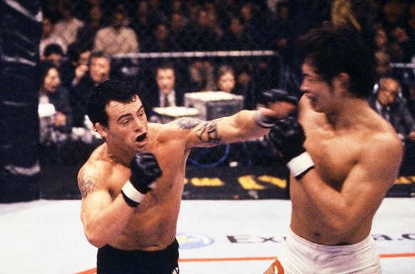 ATLANTIC CITY, NJ - FEBRUARY 23: Jens Pulver (L) defeats Caol Uno to win the UFC Bantamweight Championship at UFC 30 at the Trump Taj Mahal on February 23, 2001 in Atlantic City, New Jersey. (Photo by ...