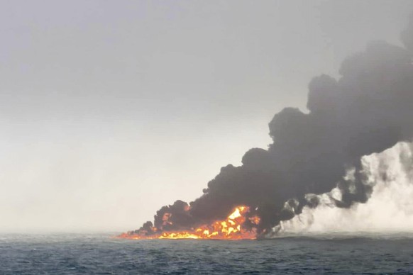 This image provided by Bartek ?mia?ek shows smoke billowing from a vessel after a cargo ship hit a tanker carrying jet fuel off eastern England on Monday, March 10, 2025 setting both ablaze and sendin ...