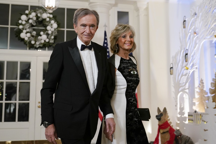 Bernard Arnault, Chairman and CEO of LVMH Moët Hennessy, and his wife Helene Mercier-Arnault arrive for the State Dinner with President Joe Biden and French President Emmanuel Macron at the White Hous ...