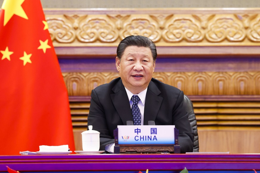 In this photo released by Xinhua News Agency, Chinese President Xi Jinping attends the 13th BRICS summit via video link in Beijing, China Thursday, Sept. 9, 2021. (Huang Jingwen/Xinhua via AP)