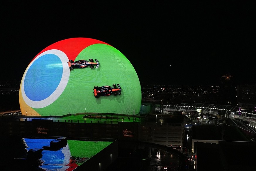 Formula One cars are displayed on the outside of the Sphere prior to the Formula One Las Vegas Grand Prix auto race, Wednesday, Nov. 15, 2023, in Las Vegas. (AP Photo/Darron Cummings)