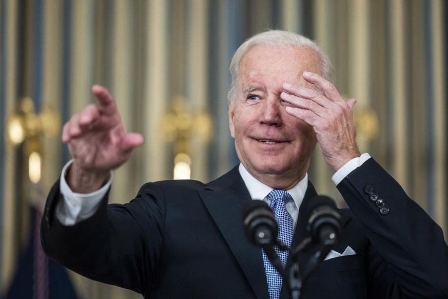 epa09567901 US President Joe Biden speaks to the media about the passage of the 1.2 trillion US dollar bipartisan infrastructure bill in the State Dining Room of the White House in Washington, DC, USA ...