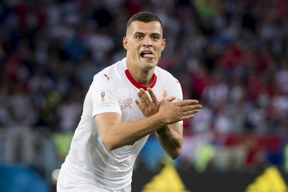 Switzerland&#039;s midfielder Granit Xhaka, celebrates after scoring a goal during the FIFA World Cup 2018 group E preliminary round soccer match between Switzerland and Serbia at the Arena Baltika St ...