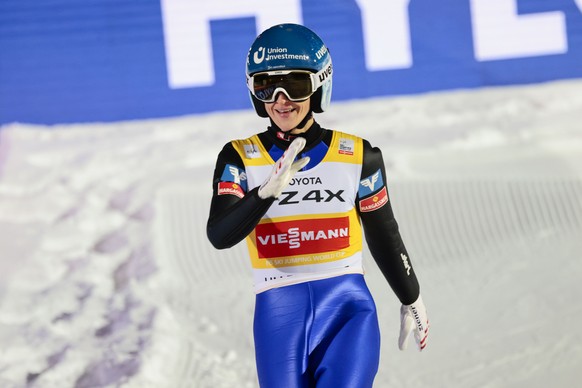 Eva Pinkelnig from Austria celebrates after finishing on 3rd position on the women&#039;s ski jumping competition in Lysgardsbakken in Lillehammer, Norway, Wednesday March 15, 2023. (Geir Olsen/NTB Sc ...