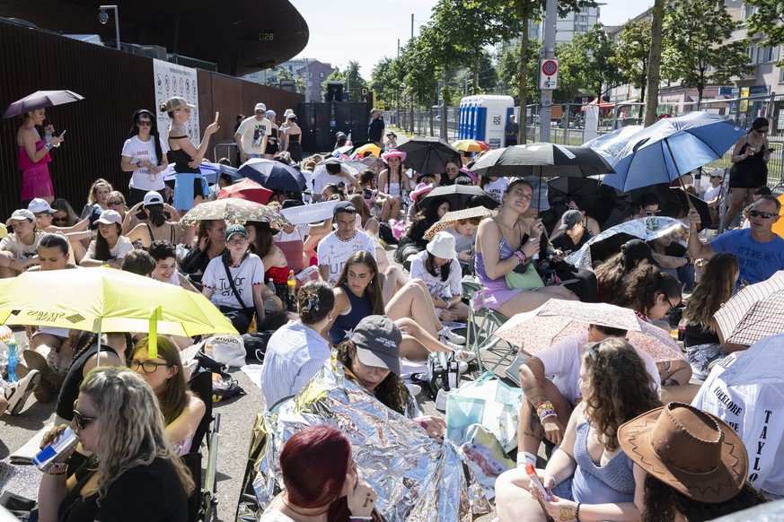 epa11467760 Fans, also known as &#039;Swifties&#039;, wait to attend the concert of US singer and songwriter Taylor Swift as part of her &#039;The Eras Tour&#039; in front of the Letzigrund Stadium in ...