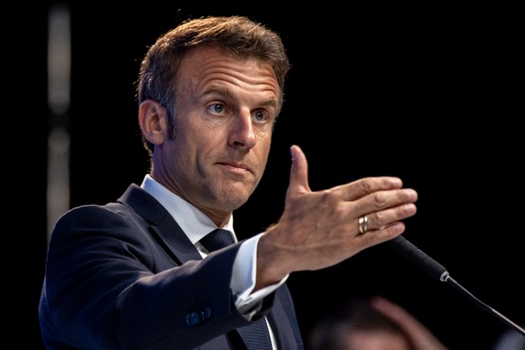 epa10664772 French President Emmanuel Macron delivers a speech during a session titled &#039;From Venus to Mars: Can Europe Hold the Line?&#039; at GLOBSEC Security Forum in Bratislava, Slovakia, 31 M ...