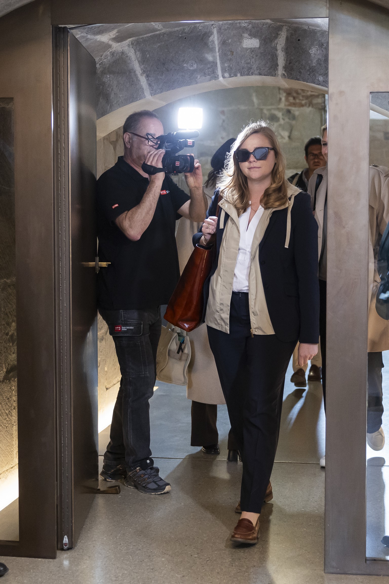 Valerie Dittli, conseillere d&#039;Etat vaudoise, arrive lors d&#039;une conference de presse au sujet des mesures prises suite a l&#039;analyse au sein du DFA ce vendredi, 21 mars 2025 a Lausanne. le ...