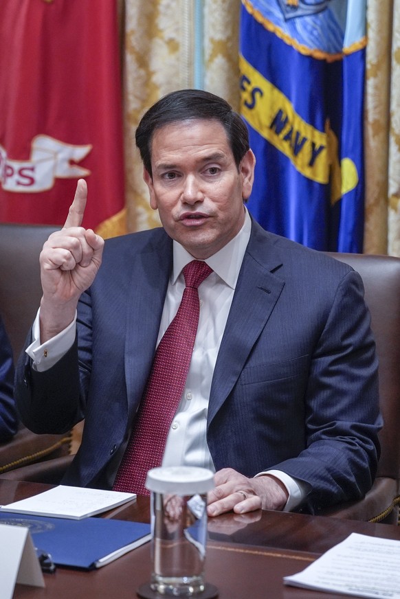 epa12565239 US Secretary of State Marco Rubio makes remarks as US President Donald J. Trump holds a meeting with his Cabinet in the Cabinet Room of the White House in Washington, DC, USA, 02 December  ...