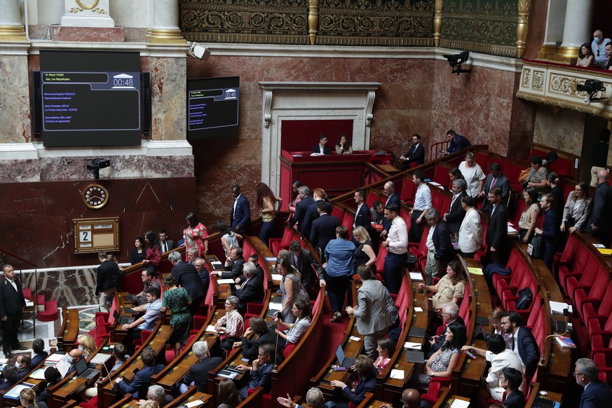 epa10102856 French members of parliament of the New Ecologic and Social Peoples Union (NUPES) leave the Hemicycle to protest against the speech of the Justice Minister Eric Dupont-Moretti (unseen) dur ...