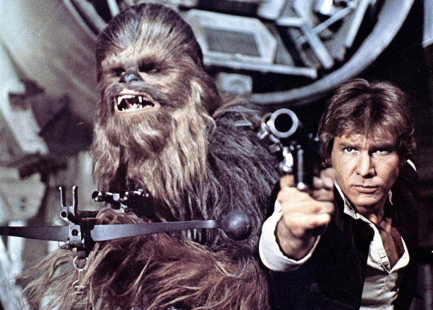 Peter Mayhew, Harrison Ford Chewbacca (Peter Mayhew) und Han Solo (Harrison Ford) wollen Prinzessin Leia Organa befreien. 1977 UnitedArchives01365576