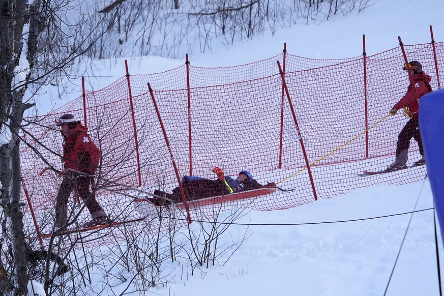 Mikaela Shiffrin, of the United States, is taken down the mountain on a sled by ski patrol after crashing during the second run of a women&#039;s World Cup giant slalom skiing race, Saturday, Nov. 30, ...