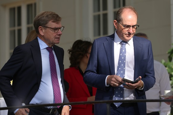 epa13191907 (L-R) German Foreign Minister Johann Wadephul and Interior Minister Alexander Dobrindt arrive for a Theme Block 4 meeting during a two-day federal cabinet retreat at Schloss Neuhardenberg  ...