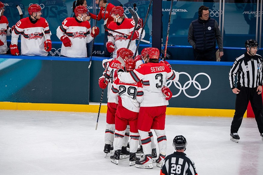 MILAN, ITALY - FEBRUARY 14: Nicholas B Jensen #48 of Denmark celebrates his goal with teammates during the Men's Preliminary Group C match between United States and Denmark on day eight of the Mi ...