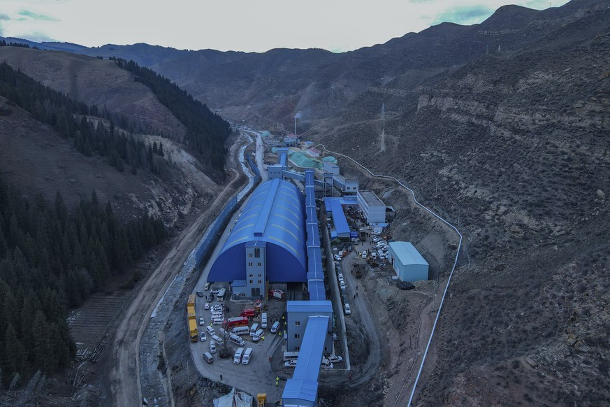 In this aerial photo released by Xinhua News Agency, shows rescue workers at a flooded coal mine in Hutubi county in of Hui Autonomous Prefecture of Changji, northwest China&#039;s Xinjiang Uyghur Aut ...