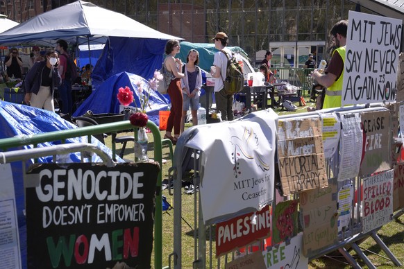 Massachusetts Institute of Technology students and supporters gather in an encampment of tents, Tuesday, May 7, 2024, on the MIT campus, in Cambridge, Mass. Students at MIT set up the encampment to pr ...