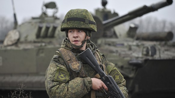 A Russian army soldier takes part in drills at the Kadamovskiy firing range in the Rostov region in southern Russia, Friday, Dec. 10, 2021. Russian troop concentration near Ukraine has raised Ukrainia ...