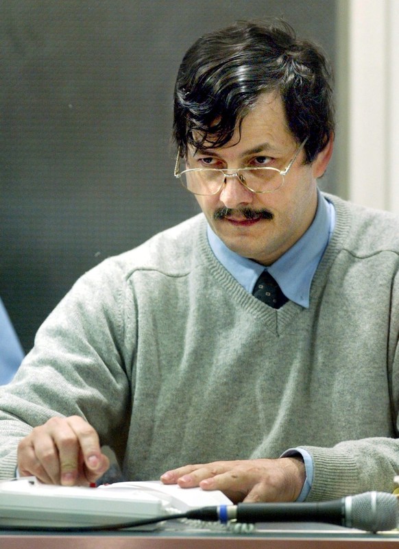 Main accused Marc Dutroux sits in the box at the Arlon assize court, Wednesday, 09 June 2004, during a session of the trial of Marc Dutroux and his accomplices Michelle Martin, Michel Lelievre and Mic ...