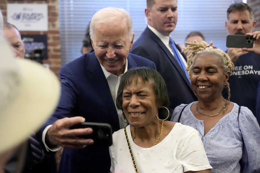 President Joe Biden, left, takes a photo with volunteers at a campaign office in Philadelphia on Sunday, July 7, 2024. (AP Photo/Manuel Balce Ceneta)
Joe Biden