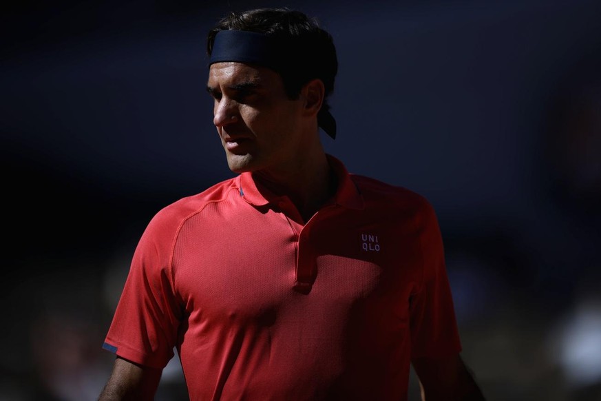 epa09239208 Roger Federer of Switzerland reacts during his first round match against Denis Istomin of Uzbekistan at the French Open tennis tournament at Roland Garros in Paris, France, 31 May 2021. EP ...