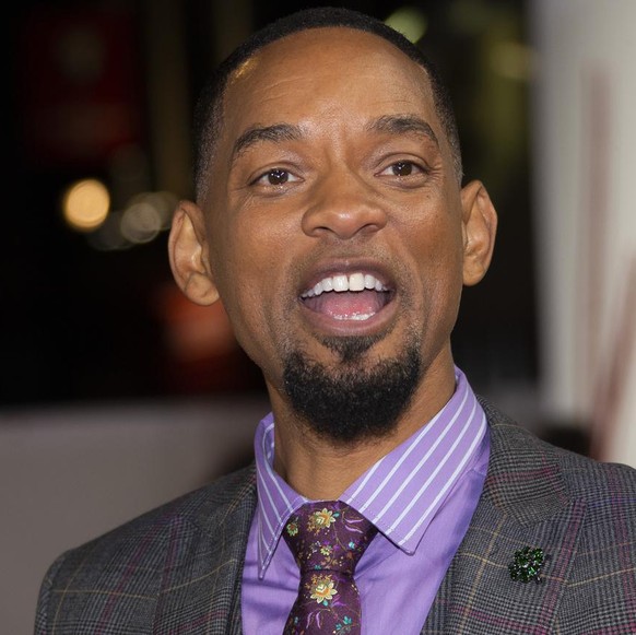 Will Smith poses for photographers upon arrival at the UK Premiere of &quot;King Richard&quot; in London, Wednesday, Nov. 17, 2021. (Photo by Joel C Ryan/Invision/AP)