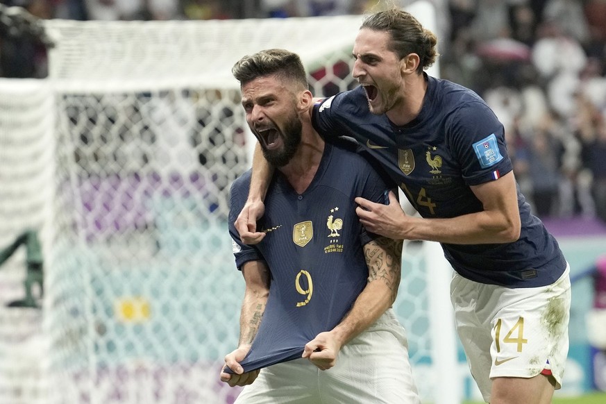 France&#039;s Olivier Giroud, left, celebrates with France&#039;s Adrien Rabiot after scoring his side&#039;s second goal during the World Cup quarterfinal soccer match between England and France, at  ...