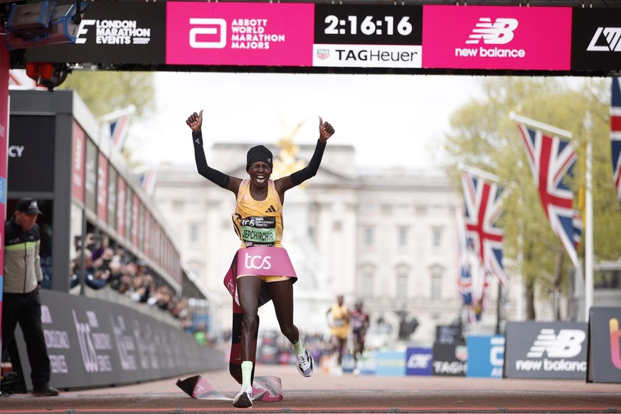 Peres Jepchirchir of Kenya crosses the finish line to win the women&#039;s race at the London Marathon in London, Sunday, April 21, 2024.(AP Photo/David Cliff)